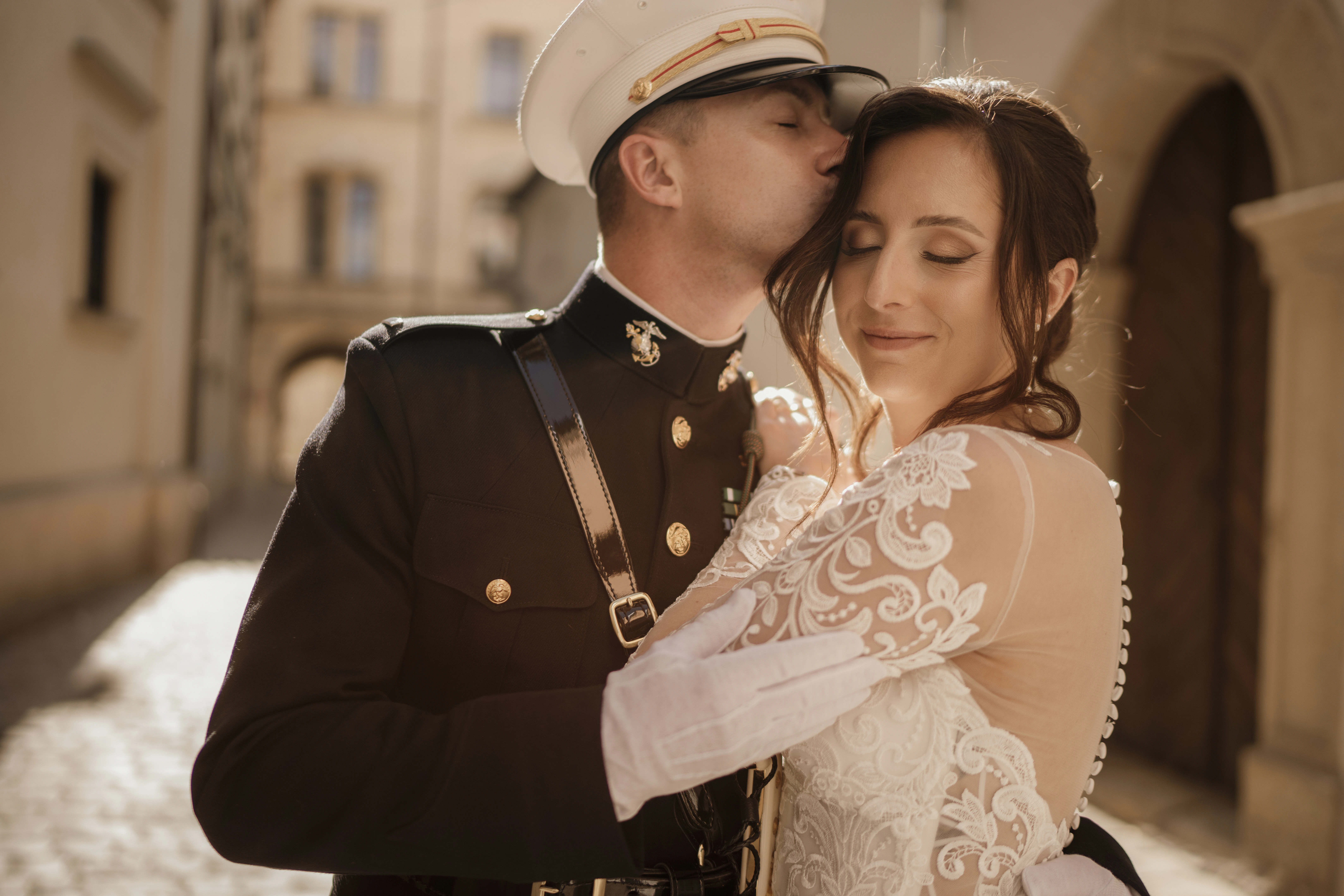 Groom kissing bride